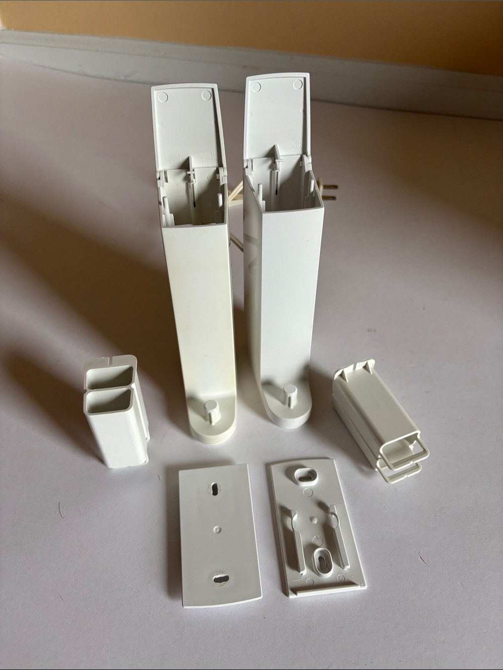 2 Oral-B electric toothbrush wall holders